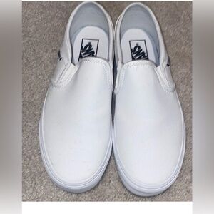 White slip on vans